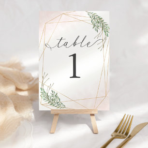 Feuilles verts et numéro de table blanche