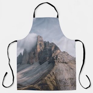 FIELD AND MOUNTAIN VIEW UNDER WHITE AND BLUE SKY APRON