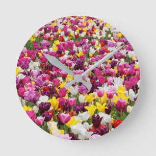 field full of tulips round clock