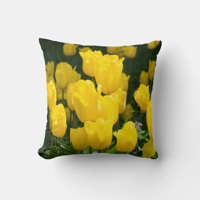Field of bright yellow tulips throw pillow (Front)