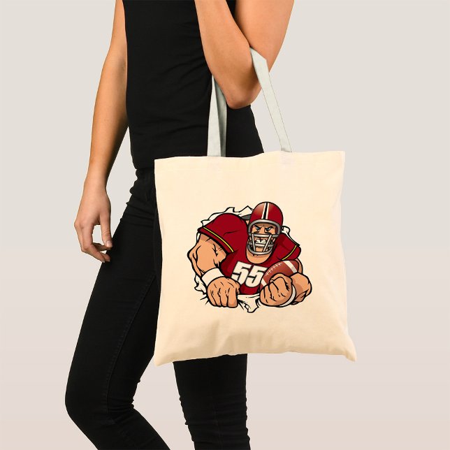 Fierce American Football Player Breaking Through  Tote Bag (Creator Uploaded)