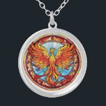 Fiery Orange Blue Phoenix Bird Silver Plated Necklace<br><div class="desc">On this unique necklace,  a fiery orange and gold Phoenix bird is rising on outstretched wings. The bird is set against a bright sky blue background,  with a stained glass mosaic style border. Colourful! Be sure to see the matching earrings and other products in our store.</div>