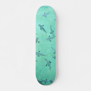 Fiji fish swimming in clear blue water skateboard