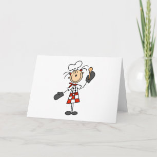 Fille de chef avec les cartes en bois de cuillère