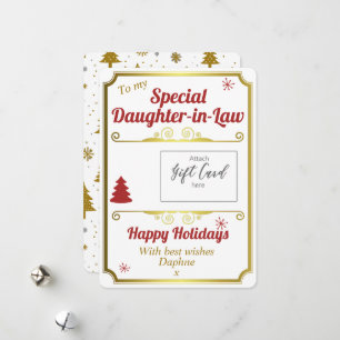 Fille en droit Détenteur de carte cadeau de Noël