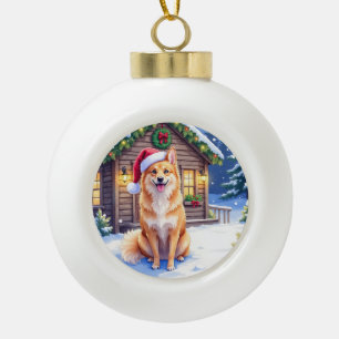 Finnish Spitz Snowy Cabin Santa Hat Christmas Art Ceramic Ball Christmas Ornament