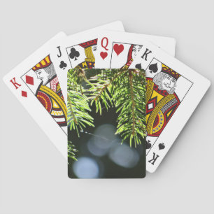 Fir pine needles with bokeh playing cards