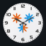 Fire and Ice Eight Point Stars Large Clock<br><div class="desc">Keep time with a piece of functional art with this fire and ice eight point star wall clock. The vibrant symmetrical graphic of orange and blue elements serves as a stunning backdrop for the clock face. This modern geometric timepiece is an excellent focal point for a home office, living room,...</div>