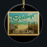 Fire Island Beach Vintage Travel Ceramic Ornament<br><div class="desc">This Greetings From Fire Island vintage postcard design features a sandy beach with a beautiful turquoise ocean water and above the sea,  a blue sky with billowy white clouds. In vintage travels style.</div>