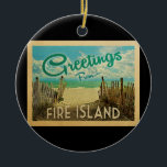 Fire Island Beach Vintage Travel Ceramic Ornament<br><div class="desc">This Greetings From Fire Island vintage postcard design features a sandy beach with a beautiful turquoise ocean water and above the sea,  a blue sky with billowy white clouds. In vintage travels style.</div>
