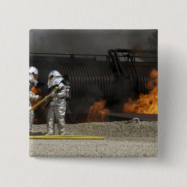 Firefighters neutralize a live fire 2 inch square button (Front)