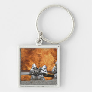 Firemen neutralize a fire keychain