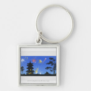 Firework display and silhouette of pagoda keychain