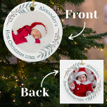 First Christmas 2 Photos Greenery & Berries Wreath Ceramic Ornament<br><div class="desc">Celebrate your baby's first Christmas with our exquisite First Christmas 2 Photos Greenery & Berries Wreath Ceramic Ornament. This ornament beautifully captures the spirit of the season and the joy of your little one's special milestone. On the front, you'll find a delicate watercolor wreath adorned with greenery and berries. Within...</div>