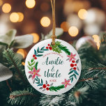 First Christmas as Auntie and Uncle  Ceramic Ornament<br><div class="desc">Celebrate the new auntie and uncle with this beautiful watercolor floral wreath with green,  red and teal toned Christmas flowers and leaves - simply customize it with the year or click “customize further” to add more text,  change the background color or add a photo.</div>