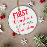 First Christmas as Grandma white with baby's photo Ceramic Ornament<br><div class="desc">This Christmas tree ornament is perfect to celebrate your first Christmas as a Grandmother. It says "First Christmas as Grandma" in a modern red font on a white background. The other side features a customizable picture of the baby, with name and date of birth. For further customization or other matching...</div>