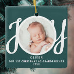 First Christmas As Grandparents Photo Green Ceramic Ornament<br><div class="desc">This keepsake First Christmas As Grandparents photo ornament is decorated with the word JOY in stylish script typography on a green background. Easily customizable.</div>