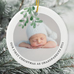 First Christmas As Grandparents Photo Watercolor Ceramic Ornament<br><div class="desc">This Grandparent's First Christmas Ornament is decorated with watercolor mistletoe.
Easily customizable with your baby's photo,  name,  and year.
Use the Design Tool to change the text size,  style,  or colour.
Because we create our artwork you won't find this exact image from other designers.
Original Watercolor © Michele Davies.</div>