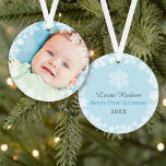 First Christmas Baby Boy Snowflake Frame Photo Ornament<br><div class="desc">Elegant snowflake framed baby's first Christmas photo ornament design features a round border wreath of white winter snowflakes that frame the baby boy's newborn photo. A custom "Baby's First Christmas" message appears on the back with text the can be personalized with baby boy's name and birth year. The baby blue...</div>