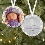 First Christmas Baby Girl Snowflake Frame Photo Ornament<br><div class="desc">Elegant snowflake framed baby's first Christmas photo ornament design features a round border wreath of white winter snowflakes that frame the baby girl's newborn photo. A custom "Baby's First Christmas" message appears on the back with text the can be personalized with baby boy's name and birth year. The silvery gray...</div>