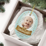 First Christmas Blue Baby Photo & Name Snow Globe Ceramic Ornament<br><div class="desc">Magical gold snow globe and gold magical stars baby's first Christmas photo keepsake ornament. Blue and gold baby's first Christmas snow globe photo keepsake ornament can be customized with the baby's name, the year, and one photo on the front and one on the back. Original hand-drawn artwork by Moodthology papery....</div>