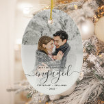 First Christmas Engaged Custom Photo Gray Script Ceramic Ornament<br><div class="desc">Commemorate your engagement with this beautiful modern keepsake ornament. The charcoal gray text reads "Our first Christmas engaged, " with the word "engaged" in elegant handwriting script with flourishes before and after. Replace the sample image with your favorite photo, and add your names and the year. A white gradient filter...</div>