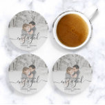 First Christmas Engaged Custom Photo Gray Script Coaster<br><div class="desc">Commemorate your engagement with this beautiful modern keepsake coaster. The charcoal gray text reads "Our first Christmas engaged, " with the word "engaged" in elegant handwriting script with flourishes before and after. Replace the sample image with your favorite photo, and add your names and the year. A white gradient filter...</div>