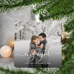 First Christmas Engaged Custom Photo White Script Metal Ornament<br><div class="desc">Commemorate your engagement with this beautiful modern keepsake ornament. The white text reads "Our first Christmas engaged, " with the word "engaged" in elegant handwriting script with flourishes before and after. Replace the sample image with your favourite photo, and add your names and the year. A black gradient filter helps...</div>