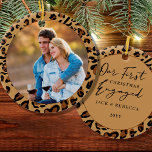 First Christmas Engaged Leopard Print Photo Ceramic Ornament<br><div class="desc">First Christmas engaged photo ornament, personalized with a photo, names and the year. The design is double sided and features leopard print frames with hand lettering. The photo template displays your picture as a round shape and the other side is lettered with "our first christmas engaged ... [last name and...</div>