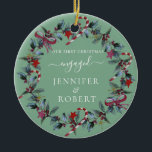 First Christmas Engaged Sage Green Wreath Ceramic Ornament<br><div class="desc">Romantic ornament for engaged or married couple features beautiful Christmas wreath. You can change the background colour if you like.</div>