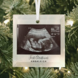 First Christmas Holiday Ultrasound Baby Reveal Glass Ornament<br><div class="desc">It's always a good time to share this exciting news with your nearest and dearest. Perfect Christmas gift idea for the grandma the rest of the family with an ultrasound photo ornament. Easily add the baby scan photo and a name by clicking the "Personalize" button Customize this unique announcement display,...</div>
