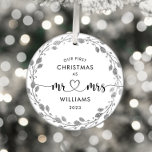 First Christmas Husband Wife Silver Wreath Photo Metal Ornament<br><div class="desc">Embrace the joy of being husband and wife during your first Christmas together with this exquisite silver glitter foliage photo frame. This frame captures the essence of the season and the beginning of your lifelong journey as a married couple.</div>