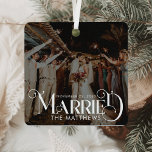 First Christmas Married Minimal Typography Photo Metal Ornament<br><div class="desc">Celebrate your first holiday as a married couple with the First Christmas Married Minimal Typography Photo Metal Ornament. This ornament blends clean, minimalist design with handwritten script and a stylish vintage Christmas vibe, offering an elegant way to mark this special occasion. Made from shatterproof metal, it ensures durability while maintaining...</div>