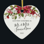 First Christmas Married Red Poinsettia Watercolor Ceramic Ornament<br><div class="desc">Elegant Christmas holiday  floral poinsettia ornament for first married Mr. and Mrs Name. Red,  white and green colours. Personalize them by adding your name.  Makes a perfect keepsake gift for your spouse (husband or wife). Heart Shape.</div>