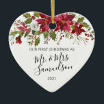 First Christmas Married Red Poinsettia Watercolor Ceramic Ornament<br><div class="desc">Elegant Christmas holiday  floral poinsettia ornament for first married Mr. and Mrs Name. Red,  white and green colours. Personalize them by adding your name.  Makes a perfect keepsake gift for your spouse (husband or wife). Heart Shape.</div>