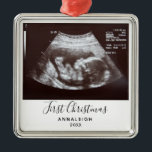 First Christmas Pregnancy Ultrasound Photo Custom Metal Ornament<br><div class="desc">It's always a good time to share this exciting news with your nearest and dearest. Perfect Christmas gift idea for the grandma the rest of the family with an ultrasound photo ornament. Easily add the baby scan photo and a name by clicking the "Personalize" button Customize this unique announcement display,...</div>