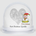 First Christmas Sparkle – Snowman Design Snowglobe<br><div class="desc">Celebrate your baby’s first holiday season with this adorable snowman design and the sweet message “First Christmas Sparkle.” Featuring a cute and cozy snowman illustration, this cheerful winter theme is perfect for marking this major milestone with warmth, joy, and a bit of seasonal sparkle. Ideal for new parents, grandparents, and...</div>