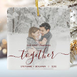 First Christmas Together Custom Photo Red Script C Ceramic Ornament<br><div class="desc">Commemorate your first Christmas as a couple, engaged or married, with this beautiful modern keepsake ornament. The dark red text reads "Our first Christmas together, " with the word "together" in elegant handwriting script with flourishes before and after. Replace the sample image with your favorite photo, and add your names...</div>