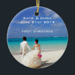 First Christmas Tropical beach Wedding Ceramic Ornament<br><div class="desc">A beach themed wedding ornament commemorating your first christmas together as a married couple. A beautiful couple in their wedding attire as seen from behind. Walking hand in hand down a gorgeous sun drenched tropical beach. White sands, crystal clear blue turquoise waters, a cloudless sky and a bright sunny day...</div>