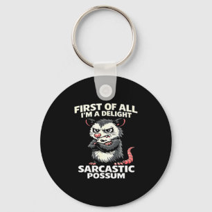First of all i'm a delight sarcastic possum tee keychain