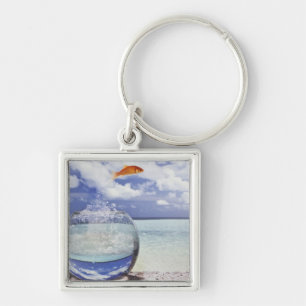 Fish jumping from fish tank keychain