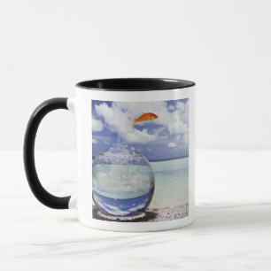 Fish jumping from fish tank mug