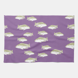 Fish on purple kitchen towel