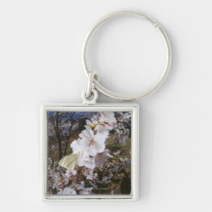 Fisheye view of Butterfly on flower Keychain