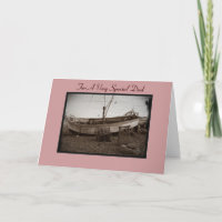 fishing boat lobster pots on pebble beach seaside