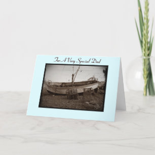 fishing boat with lobster pots on beach at seaside card