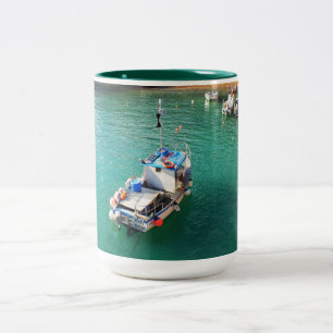 Fishing boats at high tide Two-Tone coffee mug