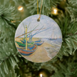 Fishing Boats | Vincent Van Gogh Ceramic Ornament<br><div class="desc">Fishing Boats on the Beach at Saintes-Maries (1888) by Dutch post-impressionist artist Vincent Van Gogh. Original artwork is an oil on canvas seascape painting depicting several fishing boats on the ocean shore.

Use the design tools to add custom text or personalize the image.</div>