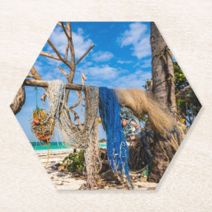 Fishing nets drying on the beach paper coaster