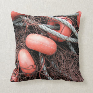 Fishing nets, floats and rope on the harbour throw pillow
